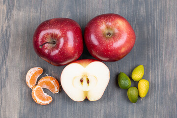 Assortment of fresh fruits on wooden surface