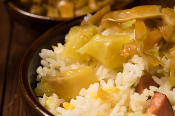 Shredded mustard on wooden background