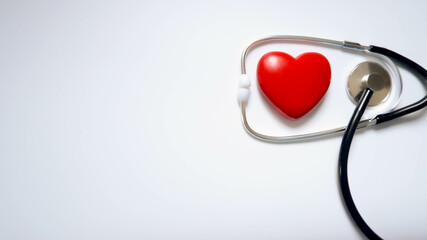 stethoscope and heart on white background
