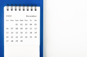 The November 2022 Monthly desk calendar for 2022 year on blue and white background.