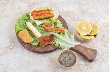 Classic grilled sausage sandwich with lettuce and lemons