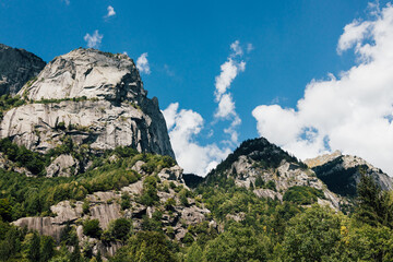 Granite rocks mountain walls in an alpine italian Val di Mello valley