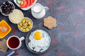 Traditional rich breakfast table with variety of foods