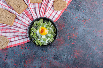 Chopped green beans cookes with eggs in a platter