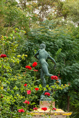 View of a naked male sculpture in the garden in Le Petit Square Garden. Setif, Algeria 