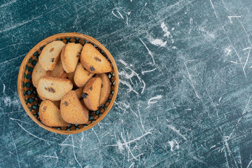 Chocolate butter crackers on blue background