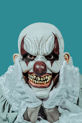 mad evil clown with a creepy smile
