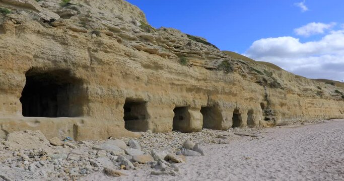 Port Willunga historic beach caves carved out by fisherman to store boats and nets, Locked off shot, Fleurieu Peninsula, South Australia,Australia