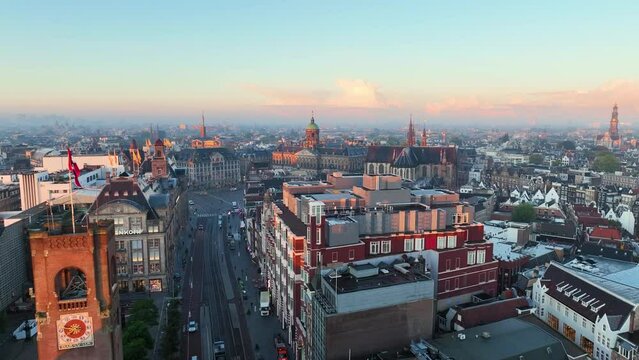 4k Aerial view of famous places Amsterdam, Netherlands. View of canal and old centre district. Koninklijk Paleis Amsterdam view at sunrise