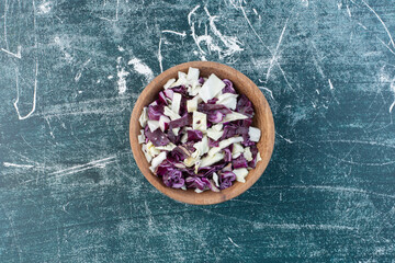 Salad with chopped purple cabbages and cauliflowers