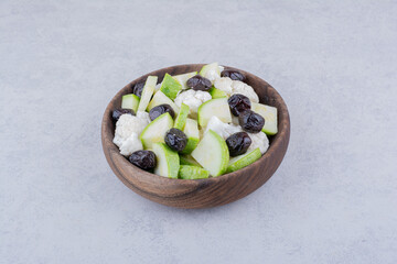 Salad with black olives, herbs and vegetables