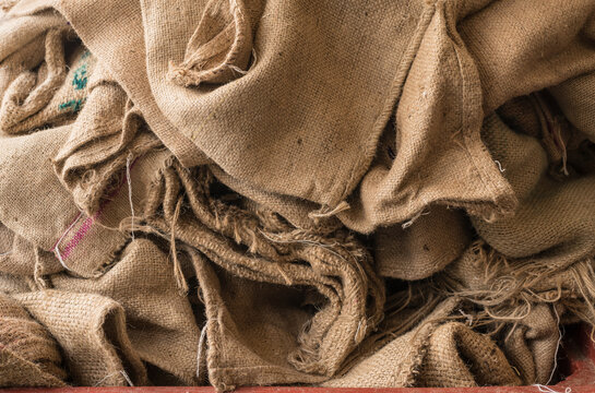 Recycling background from old jute bags or sacks burlap ready for reuse sustainability natural fibre
