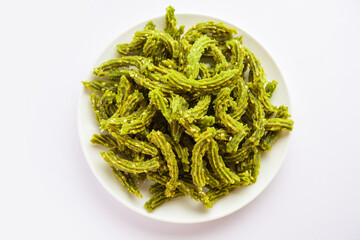 Palak Chakli sticks or Spinach Murukku pieces, healthy Indian festival or tea time snack