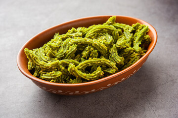 Palak Chakli sticks or Spinach Murukku pieces, healthy Indian festival or tea time snack