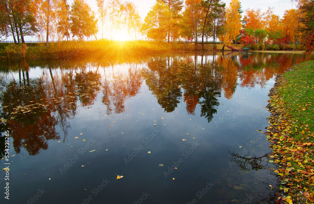 Sticker Autumn landscape with lake, green grass and colourful trees