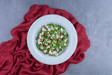 Green salad with cauliflowers and pomegranate seeds