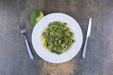 Chopped green beans cooked with eggs