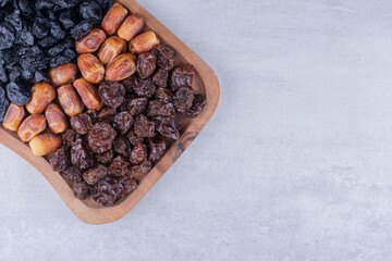 Dry fruits combination on a wooden platter