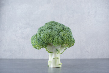 Green broccoli isolated on grey background