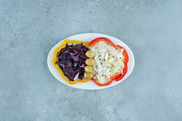 Vegetable salad with chopped and minced cauliflower, cabbage and other ingredients