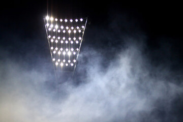 Lighting mast of football soccer stadium at night