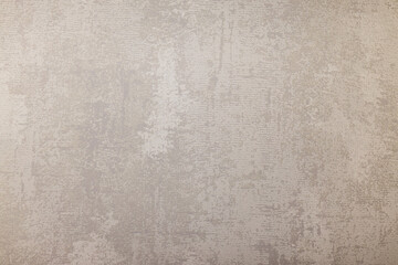 Textured stucco wall background with a messy decorative canvas pattern