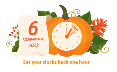 Daylight saving time ends 2022 concept. Alarm clock and calendar with the date of sunday, November 6