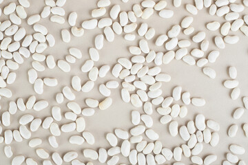 White beans isolated on concrete background