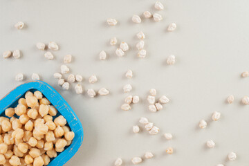 Pea beans in a food tray on concrete background