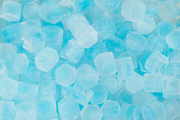 Blue ice cubes background texture. freshness. freezing. pieces of ice close up