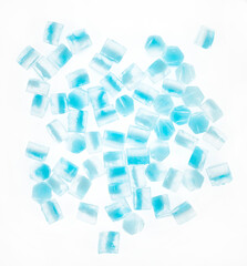 Blue ice cubes isolated white background. freshness. freezing. frozen pieces of ice close up