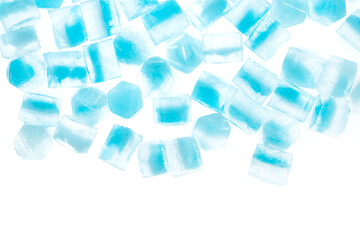 Blue ice cubes isolated white background. freshness. freezing. frozen pieces of ice close up