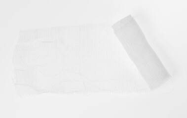 Obraz premium Medical cloth bandage on white background