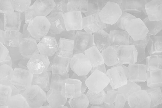 White ice cubes background texture. freshness. freezing. frozen pieces of ice close up