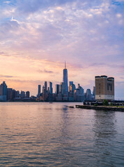 Fototapeta na wymiar city skyline at sunrise Manhattan skyscraper downtown 