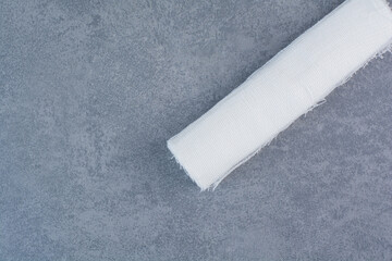 White medical bandage on marble background