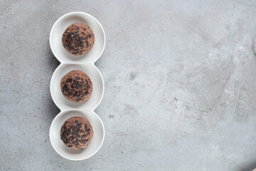 Delectable chocolate chip cookies on a platter on marble background