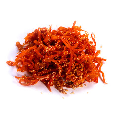 dried squid with sesame seeds and peppers on a white background