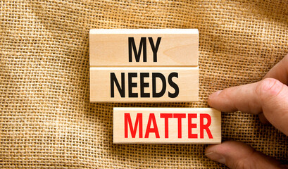 My needs matter symbol. Concept words My needs matter on wooden blocks. Businessman hand. Beautiful...