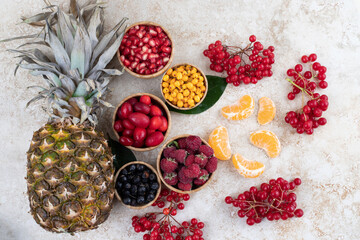 A wooden bowls full of delicious berries