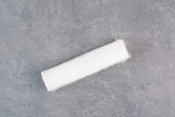 White medical bandage on marble background