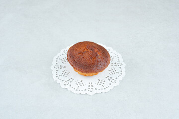 Fototapeta na wymiar One whole delicious sweet cupcake on white background