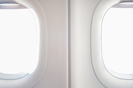 Windows of modern plane in daytime