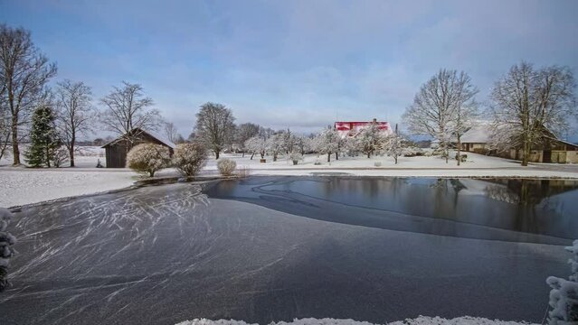 All Four Season Time Lapse. Yearly Weather Changing Above Lake and Lakefront Household in Countryside