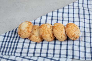 Sweet fresh round cookies on tablecloth