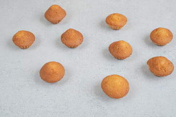 Sweet fresh cupcakes on white background