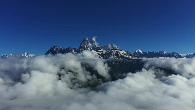 Aerial view of Ushba mountains is one of the most notable peaks of the Caucasus Mountains. It is located in the Svaneti region of Georgia.