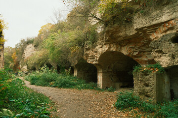 Beautiful ruins overgrown with vegetation of Tarakaniv fortress with  - Tarakaniv village, Dubno district of Rivne Region, Ukraine. Abandoned Military Tarakaniv Fort, Dubno Fort