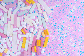 Variety of chewing gums laid out on a colorful background
