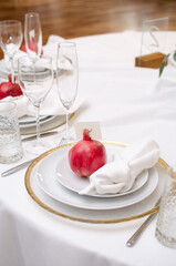 Beautiful wedding decoration. Banquet table setting and decoration. Flower decoration of wedding tables. Cutlery on the table.